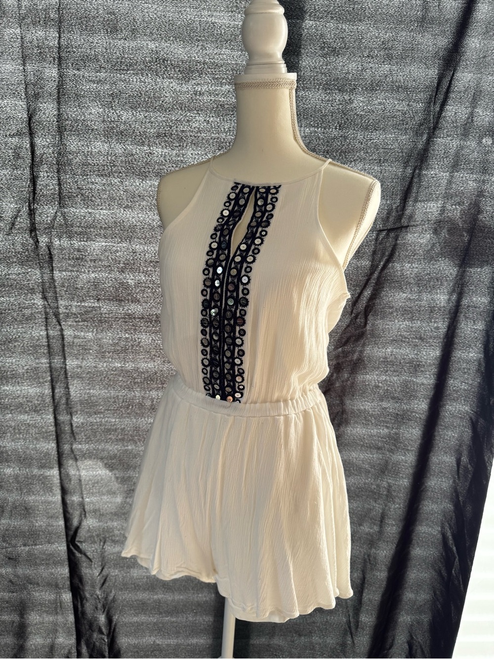 Alya White Sleeveless Romper with Navy Blue Embellishmet
